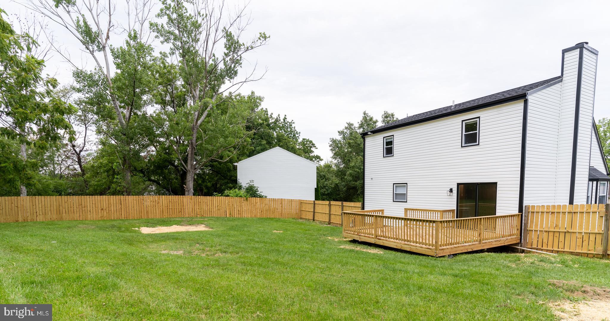 7010 Glen Spring Road Windsor Mill, MD 21244 - Photo 46 of 47 Expansive Rear Deck and Fully-Fenced Yard