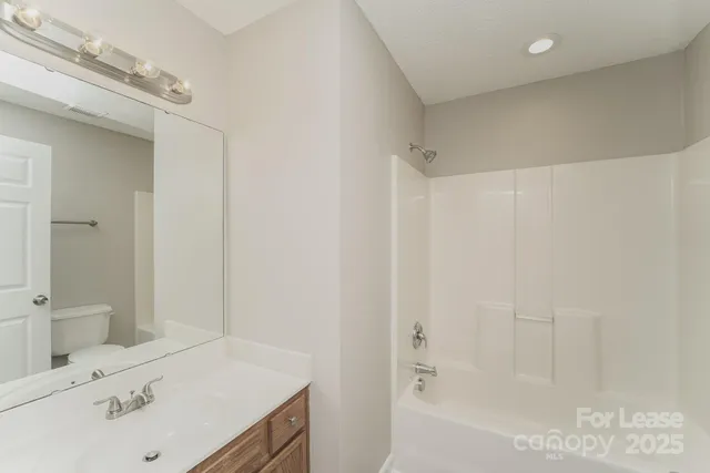 a bathroom with a sink and a bathtub