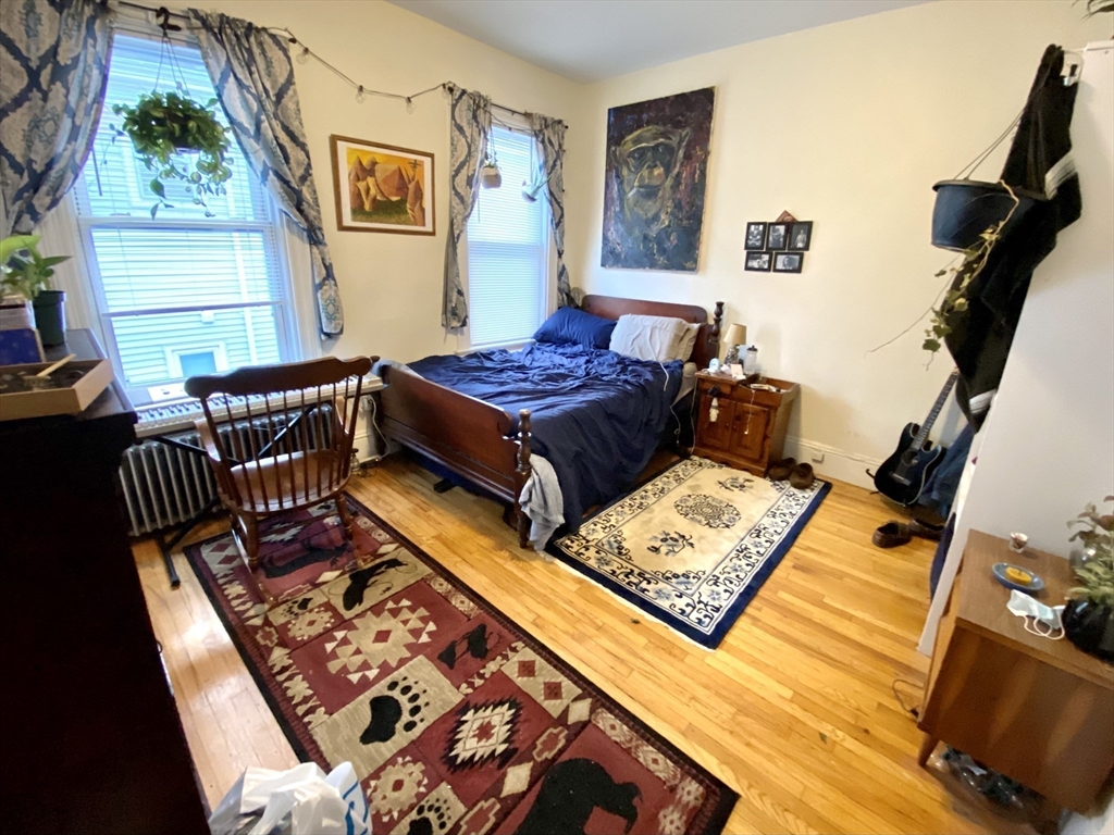 3 Oswald Street, Unit 3 Boston, MA 02120 - Photo 15 of 23 a living room with furniture rug and window