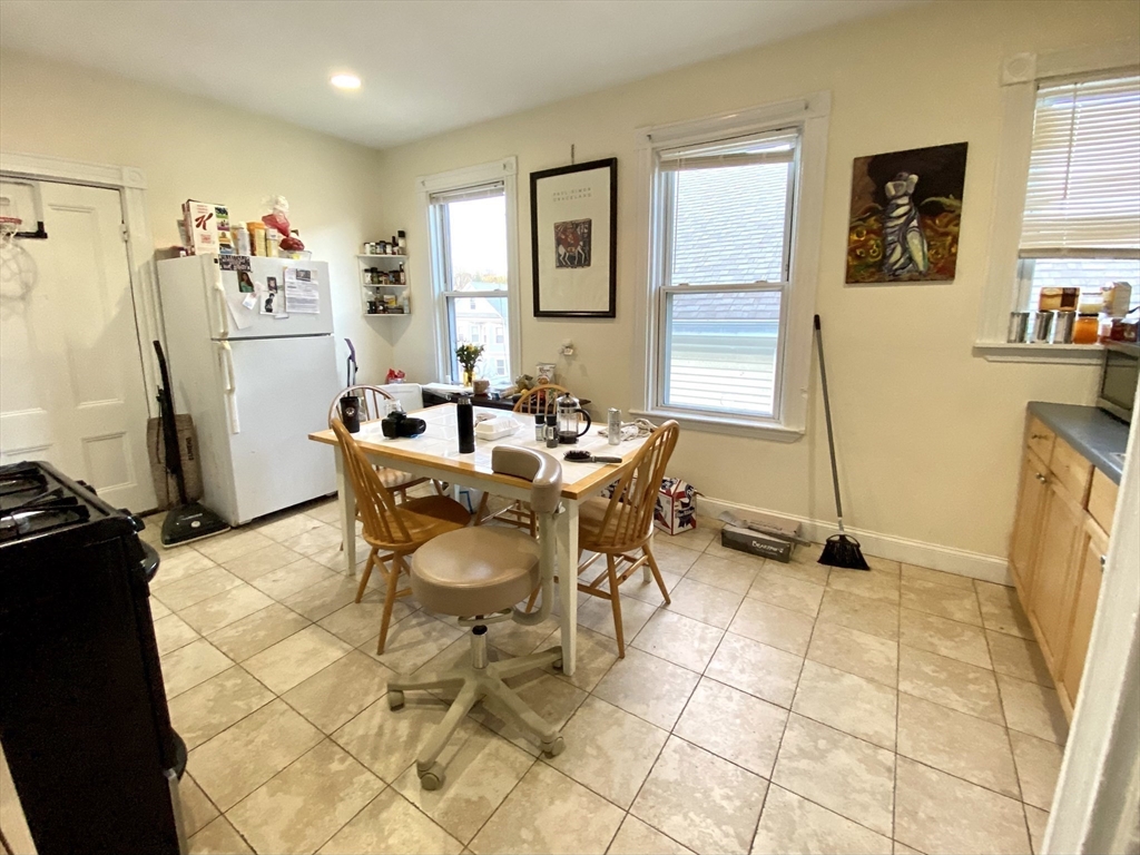 3 Oswald Street, Unit 3 Boston, MA 02120 - Photo 19 of 23 a dining room with furniture and a window