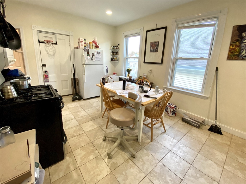 3 Oswald Street, Unit 3 Boston, MA 02120 - Photo 22 of 23 a living room with patio furniture and a window