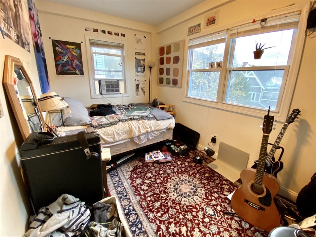 3 Oswald Street, Unit 3 Boston, MA 02120 - Photo 6 of 23 a living room with furniture and a window