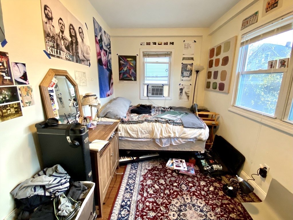 3 Oswald Street, Unit 3 Boston, MA 02120 - Photo 8 of 23 a room with furniture and window