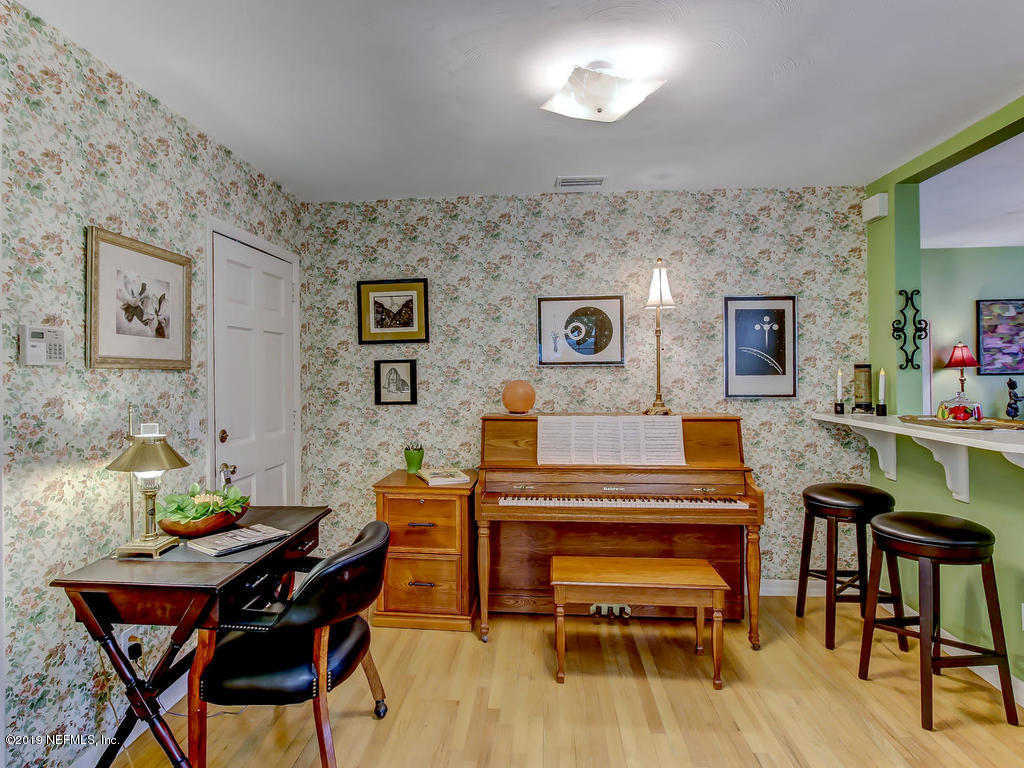 365 9th Street Atlantic Beach, FL 32233 - Photo 15 of 37 a view of a dining room with furniture and wooden floor