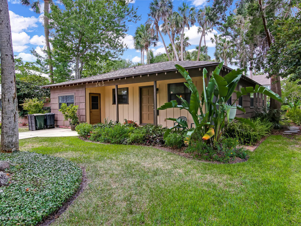 365 9th Street Atlantic Beach, FL 32233 - Photo 2 of 37 a front view of a house with garden