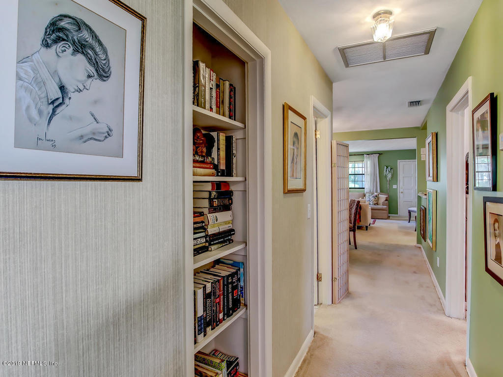 365 9th Street Atlantic Beach, FL 32233 - Photo 21 of 37 a view of a hallway with shelves