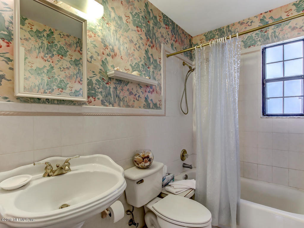 365 9th Street Atlantic Beach, FL 32233 - Photo 22 of 37 a bathroom with a sink toilet and shower