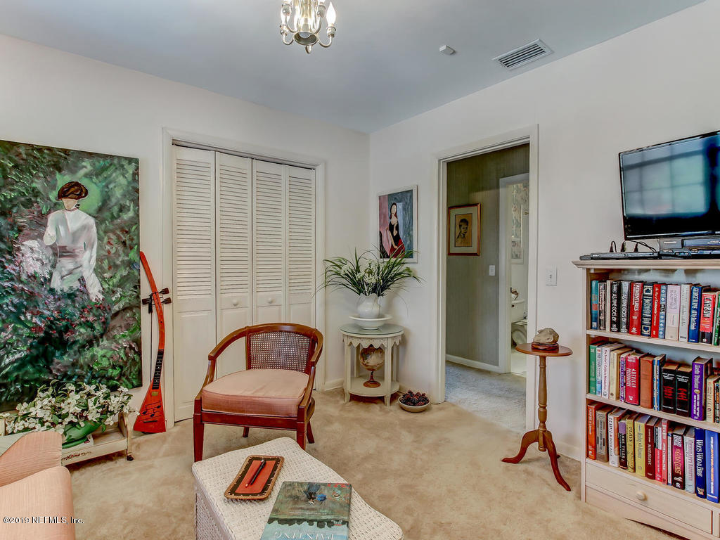 365 9th Street Atlantic Beach, FL 32233 - Photo 24 of 37 a living room with furniture and a flat screen tv