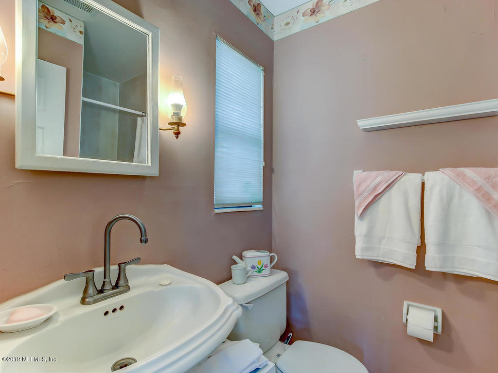 365 9th Street Atlantic Beach, FL 32233 - Photo 25 of 37 a bathroom with a sink and a toilet