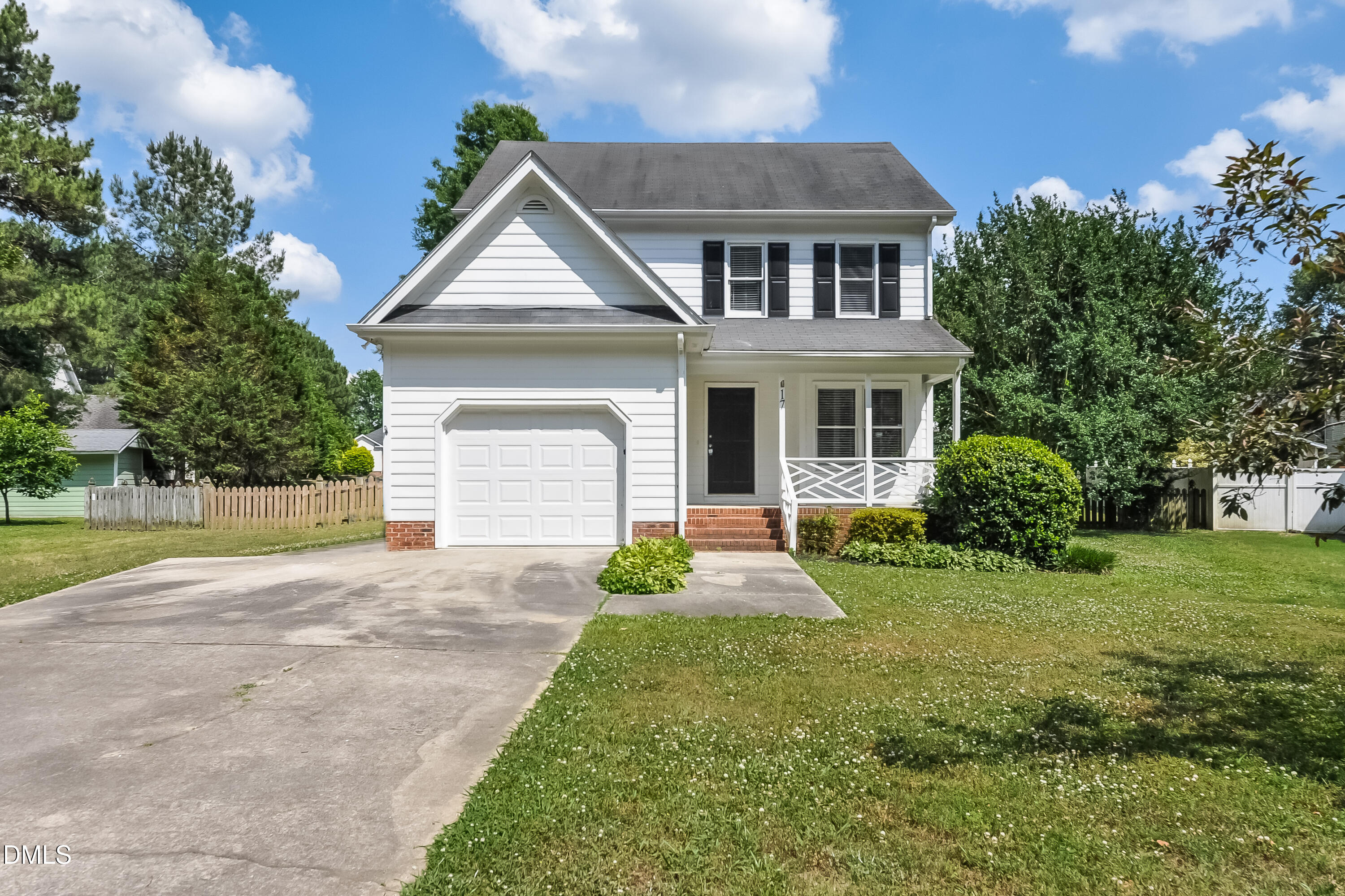 17 Brookwood Drive Smithfield, NC 27577 - Photo 1 of 17 a front view of a house with garden