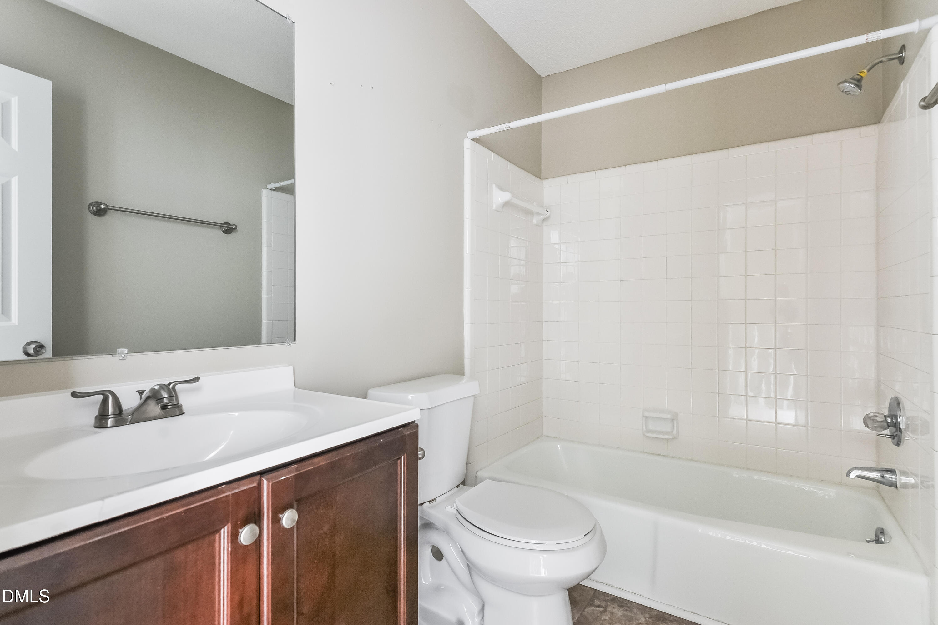 17 Brookwood Drive Smithfield, NC 27577 - Photo 13 of 17 a bathroom with a sink a toilet and a bathtub