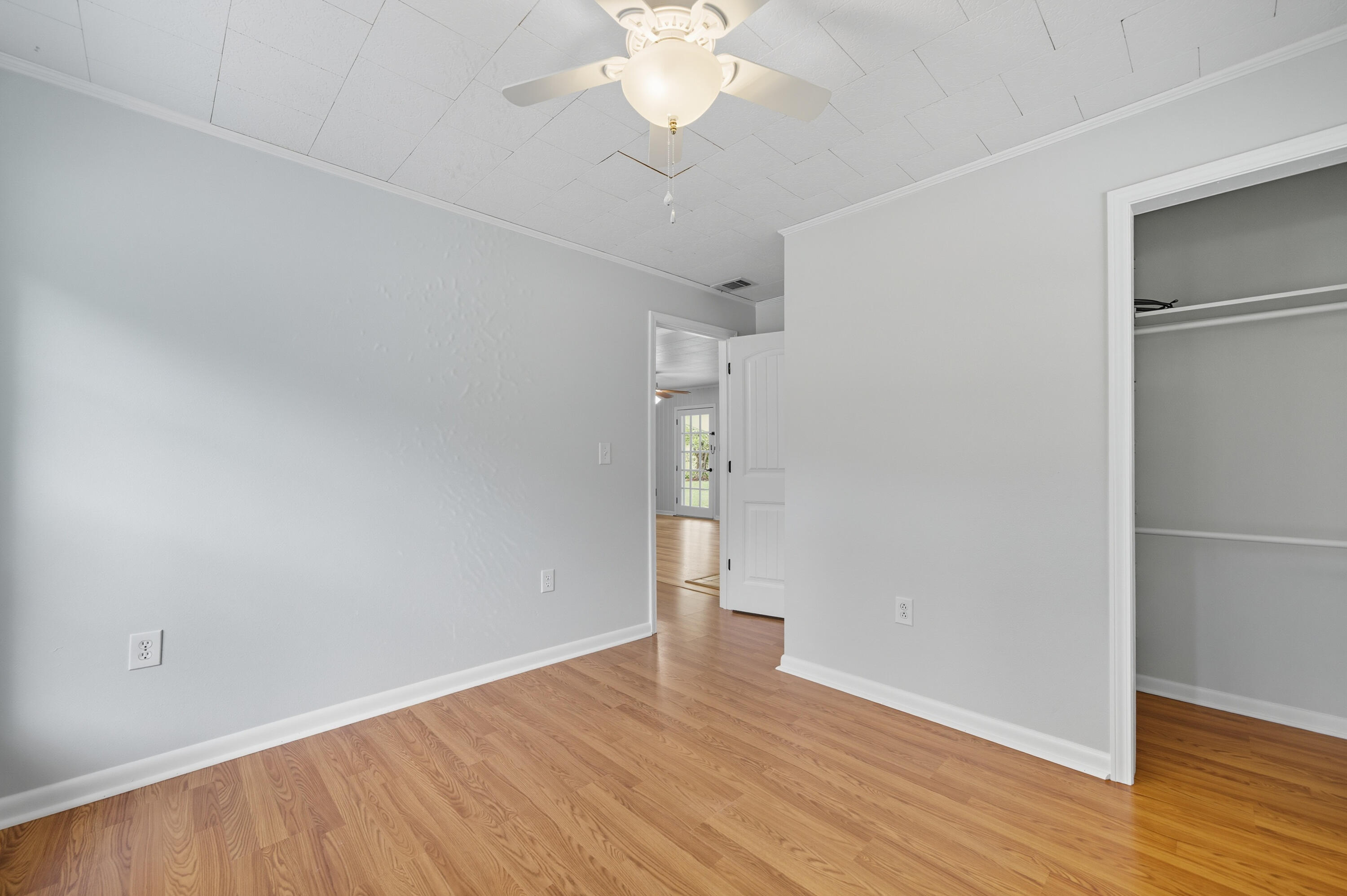 2128 3rd Avenue Crestview, FL 32539 - Photo 22 of 50 wooden floor in an empty room with a window