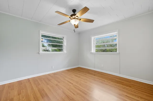 a view of an empty room with a window