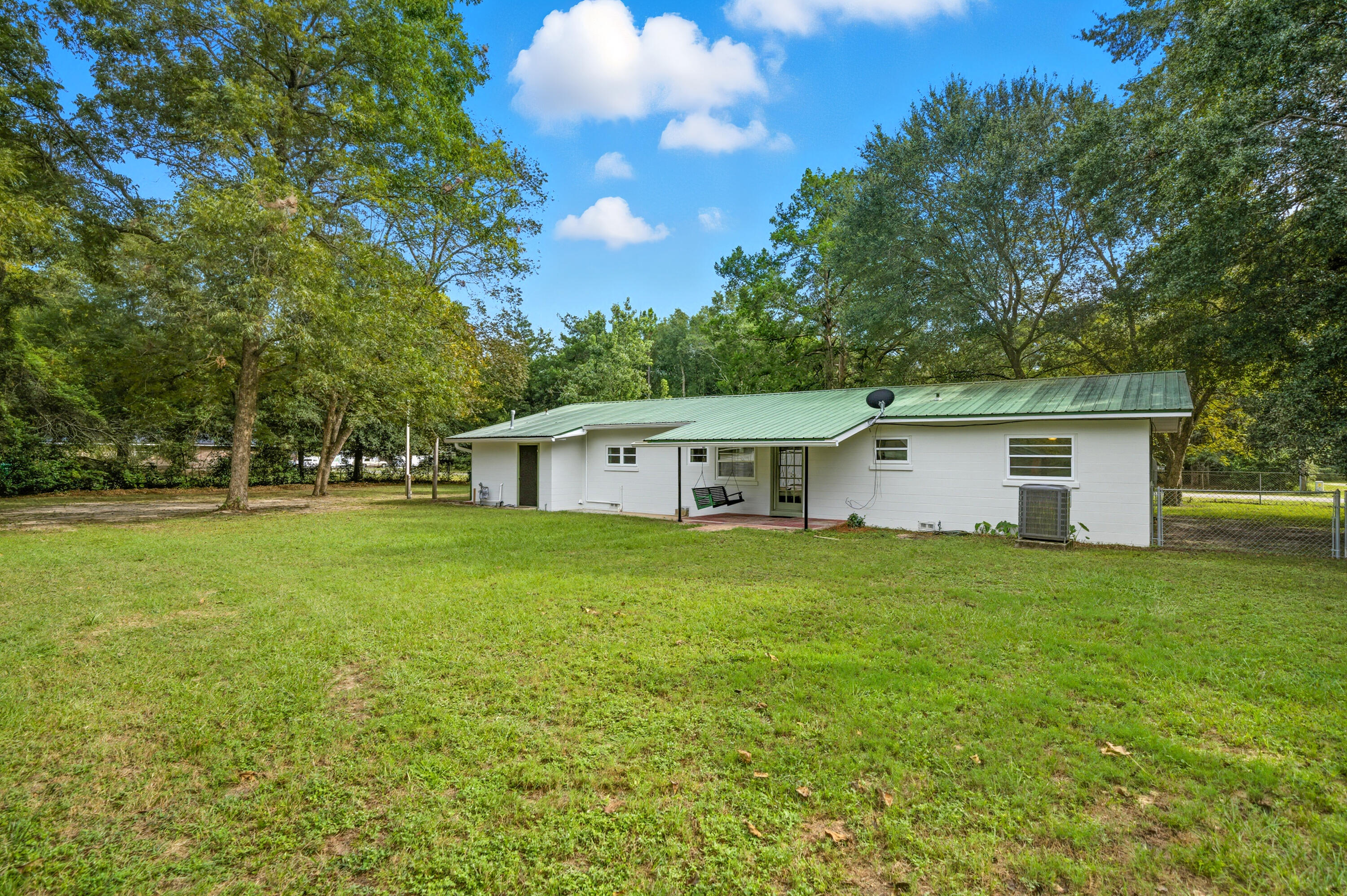 2128 3rd Avenue Crestview, FL 32539 - Photo 36 of 50 a house view with a garden space