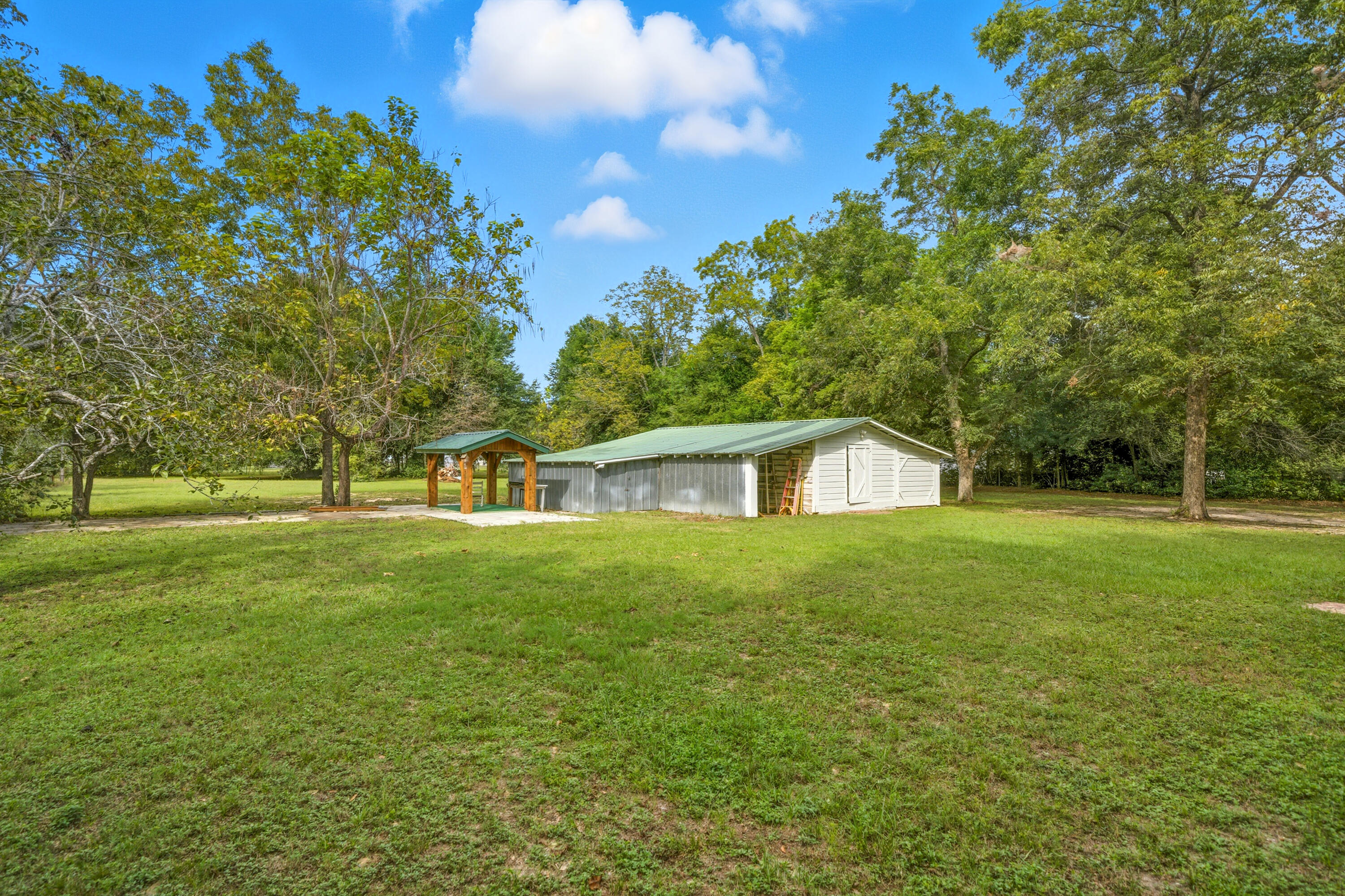 2128 3rd Avenue Crestview, FL 32539 - Photo 40 of 50 a front view of a house with garden