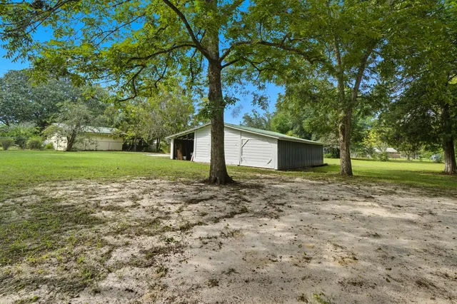 a view of a chairs and table in a room