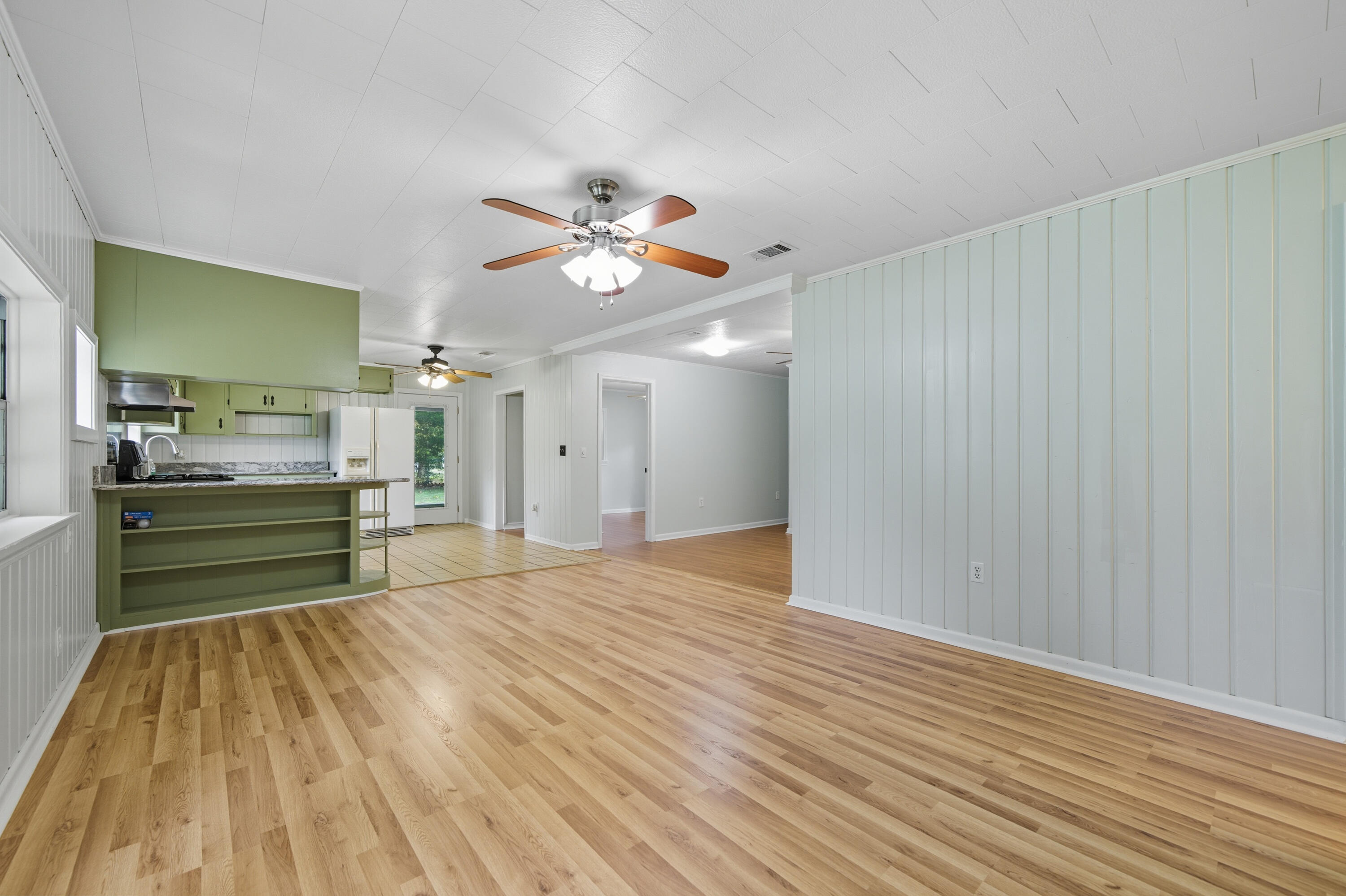2128 3rd Avenue Crestview, FL 32539 - Photo 6 of 50 wooden floor in an empty room with a window