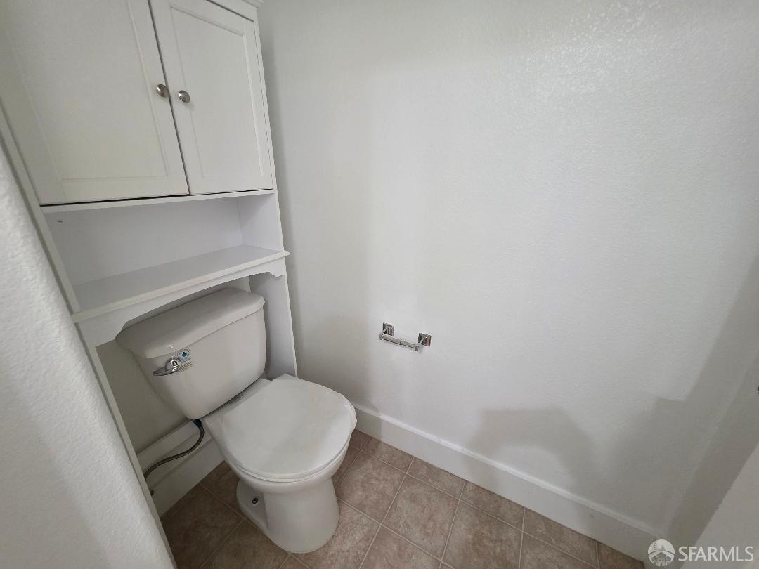 2415 Stearman Court, Unit 7 San Jose, CA 95132 - Photo 11 of 13 a white toilet sitting next to a sink