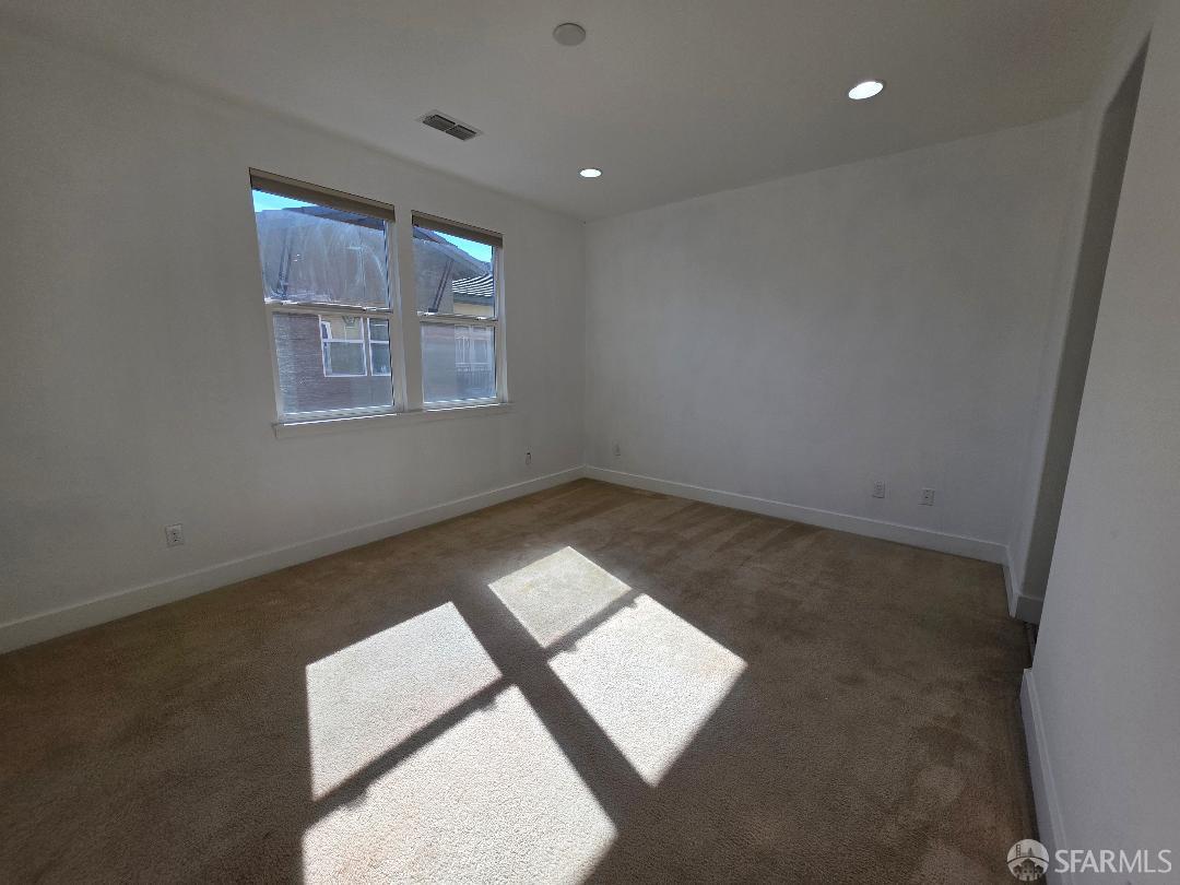 2415 Stearman Court, Unit 7 San Jose, CA 95132 - Photo 5 of 13 an empty room with a window