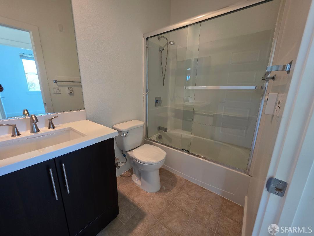 2415 Stearman Court, Unit 7 San Jose, CA 95132 - Photo 9 of 13 a bathroom with a sink a toilet and shower