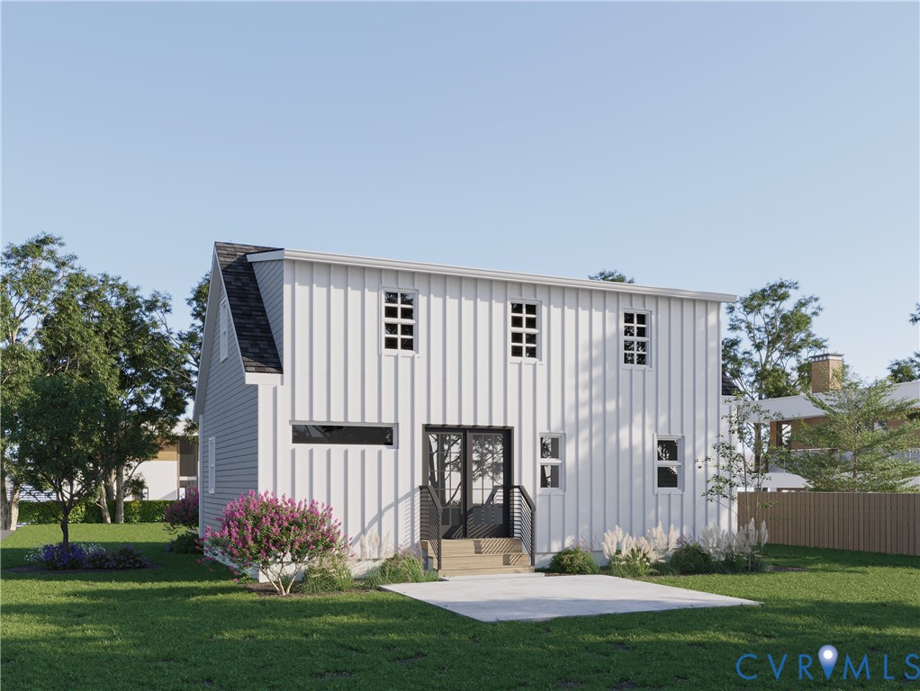 5206 Gillespie Avenue Henrico, VA 23228 - Photo 2 of 4 a front view of a house with garden