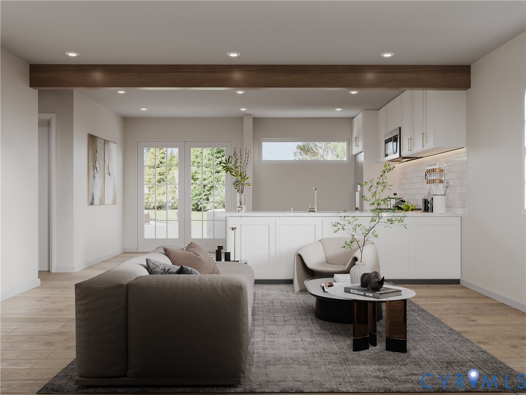 5206 Gillespie Avenue Henrico, VA 23228 - Photo 4 of 4 a living room with furniture and a large window
