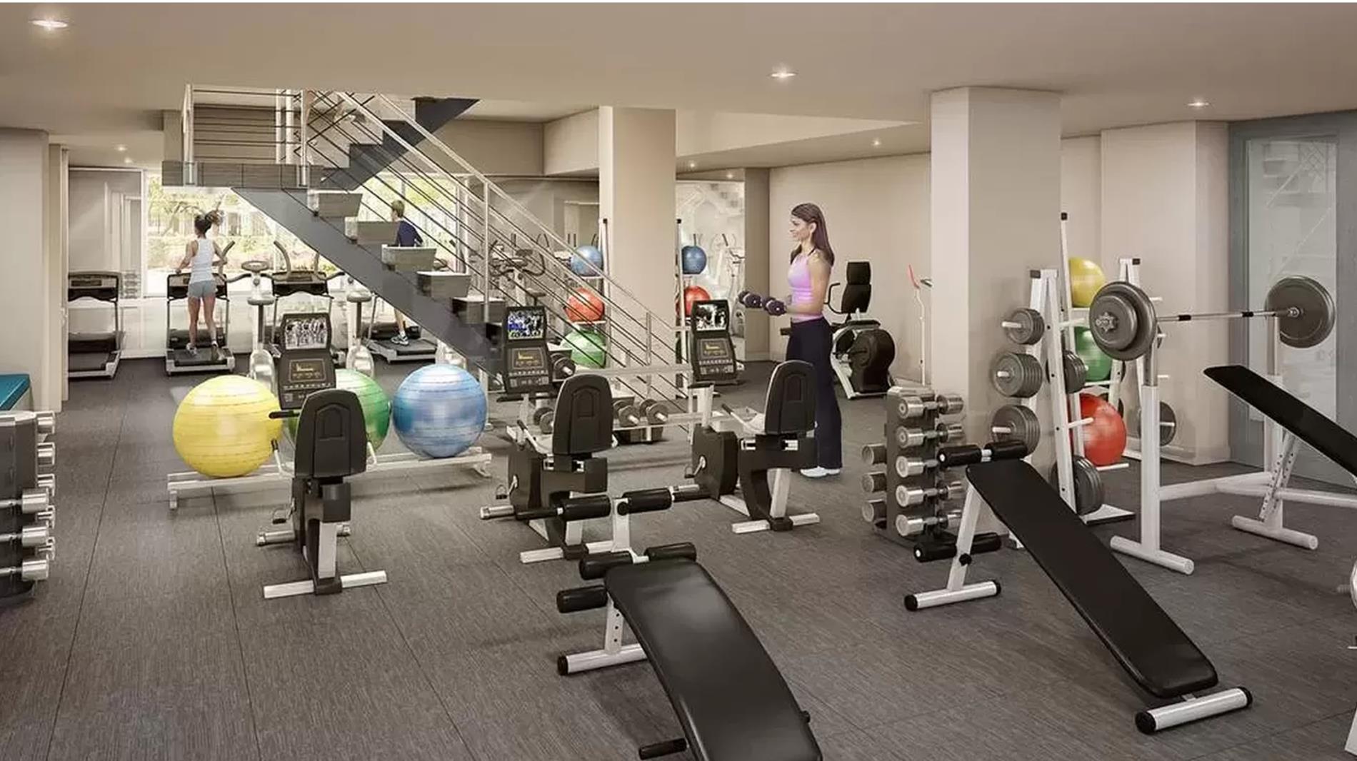 225 Rector Place, Unit 22H Manhattan, NY 10280 - Photo 11 of 13 a view of a room with gym equipment