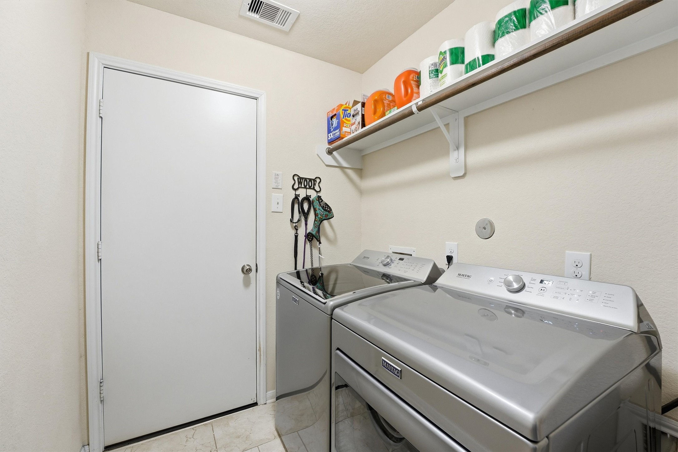 2115 Pacific Loon Lane Conroe, TX 77385 - Photo 22 of 26 a utility room with dryer and washer