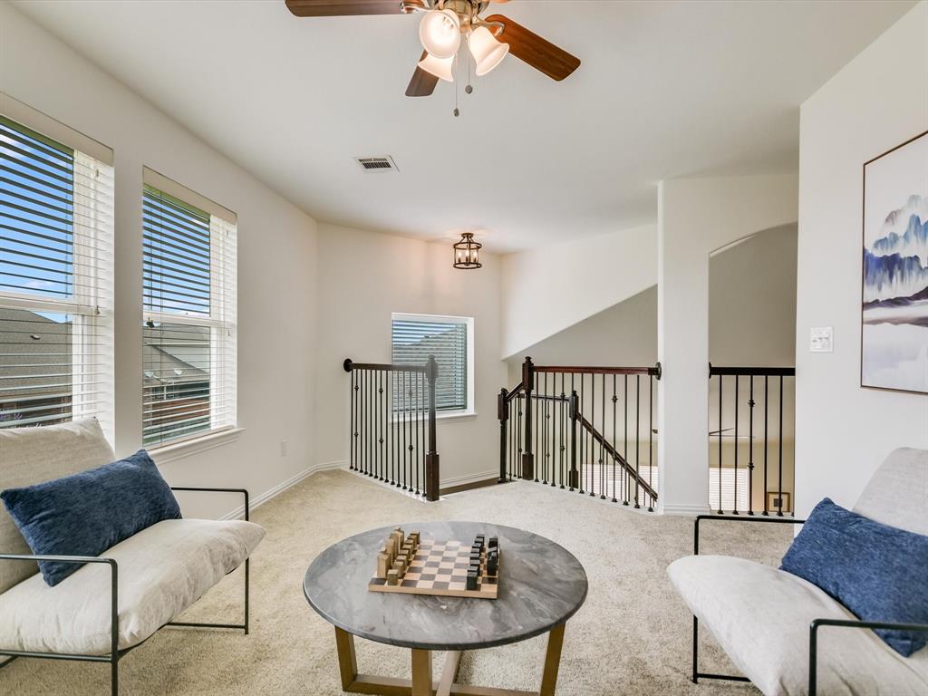 736 Bonnet Boulevard Georgetown, TX 78628 - Photo 10 of 27 a living room with furniture and a table