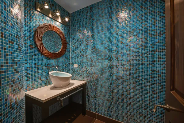a bathroom with a toilet a sink and a shower