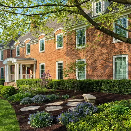 front view of a house with a yard