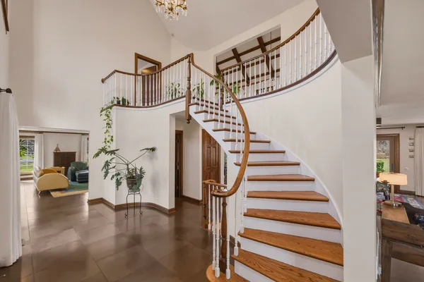 a view of entryway livingroom and hall