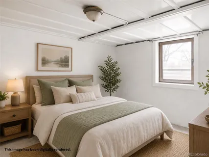 a bedroom with a large bed and a window