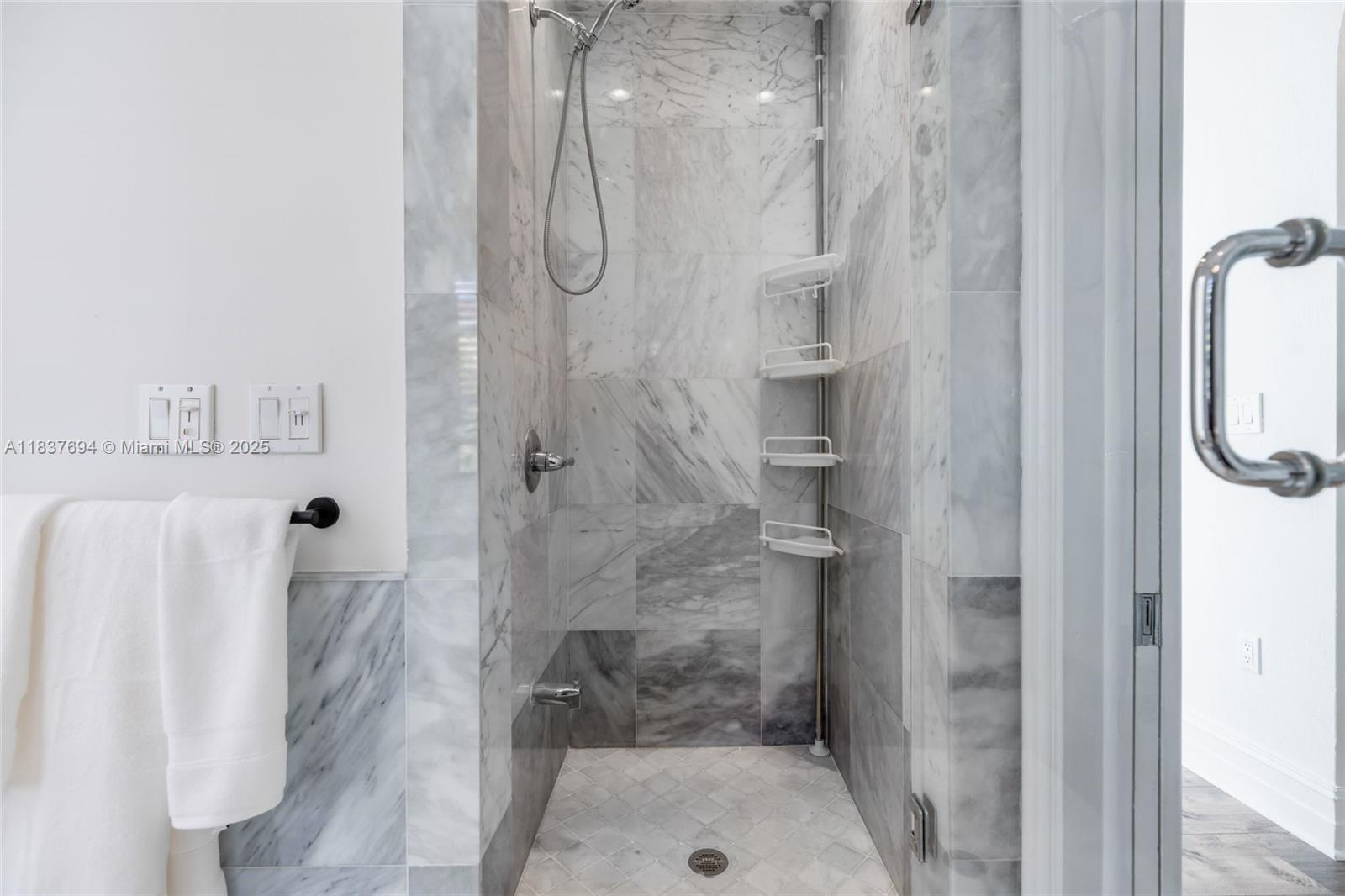 113 Northeast 101st Street Miami Shores, FL 33138 - Photo 30 of 56 a bathroom with a shower