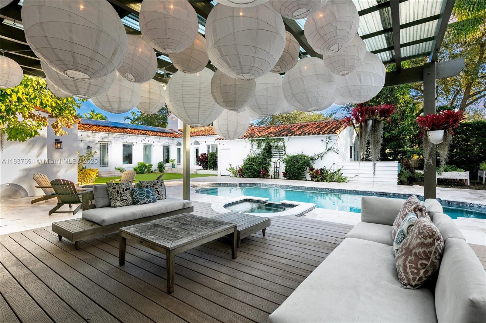 113 Northeast 101st Street Miami Shores, FL 33138 - Photo 42 of 56 a building outdoor space with patio furniture