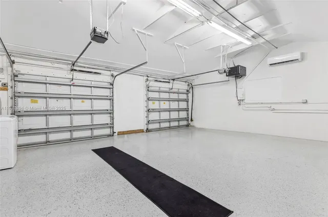a view of a patio with table and chairs and potted plants