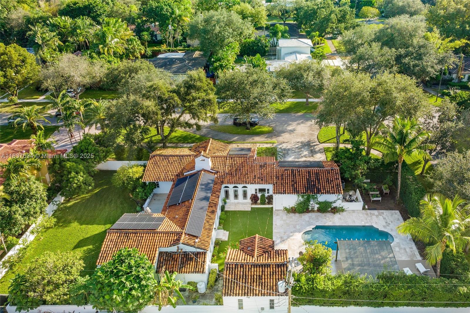 113 Northeast 101st Street Miami Shores, FL 33138 - Photo 54 of 56 an aerial view of a house with yard swimming pool and outdoor seating