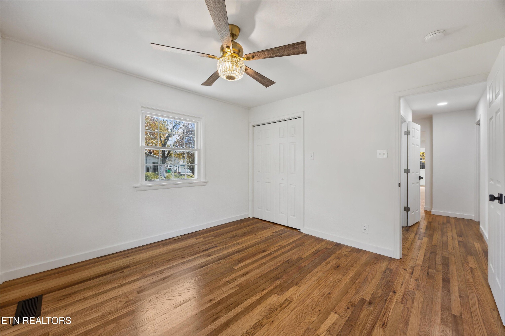 100 Pearl Road Oak Ridge, TN 37830 - Photo 24 of 37 a view of empty room with wooden floor