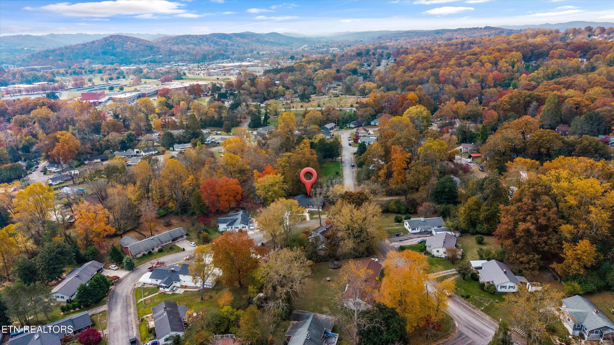 100 Pearl Road Oak Ridge, TN 37830 - Photo 36 of 37 an aerial view of a city with lots of residential buildings