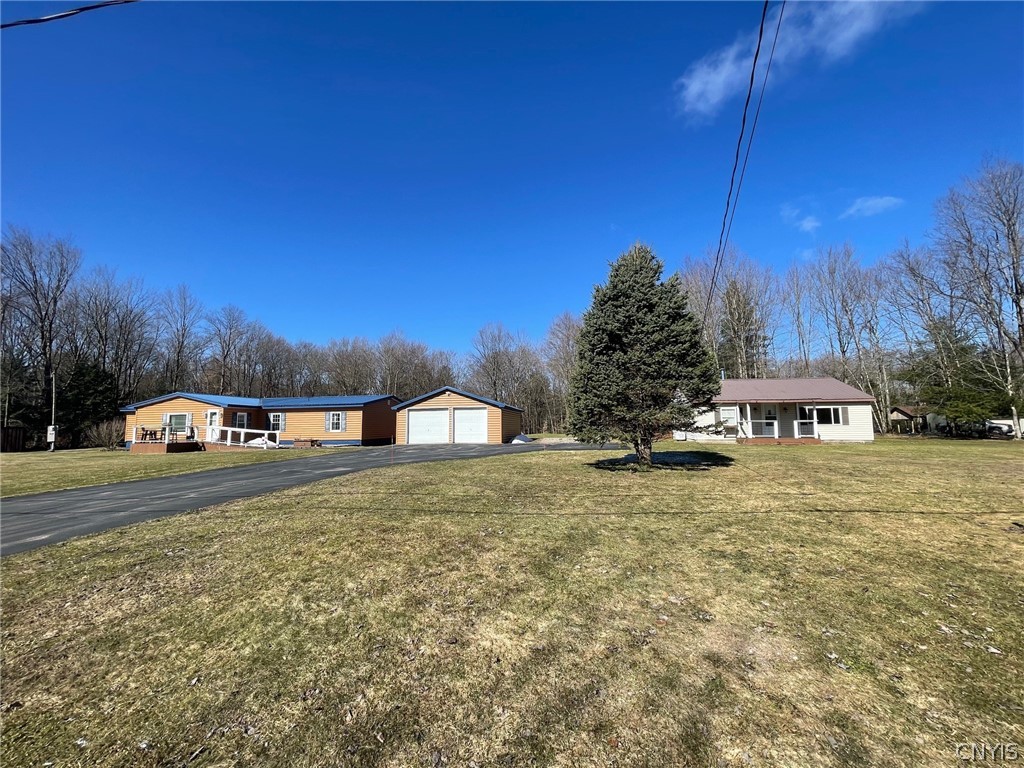 Two houses on one 5.67 +/- acre parcel!