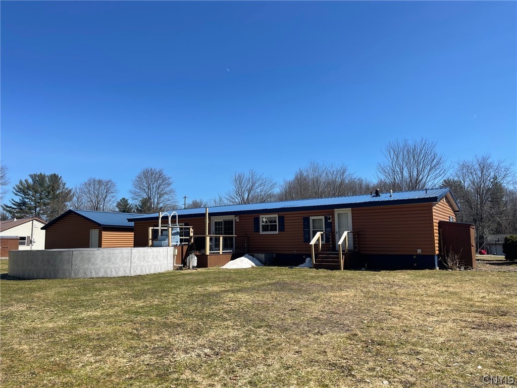 8273 Kimball Road Vienna, NY 13308 - Photo 3 of 47 Main house - rear view