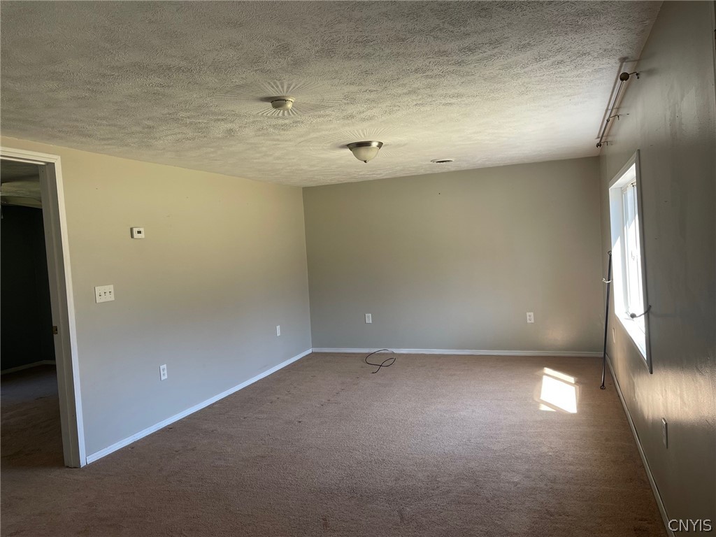 8273 Kimball Road Vienna, NY 13308 - Photo 41 of 47 Little Ranch house - living room