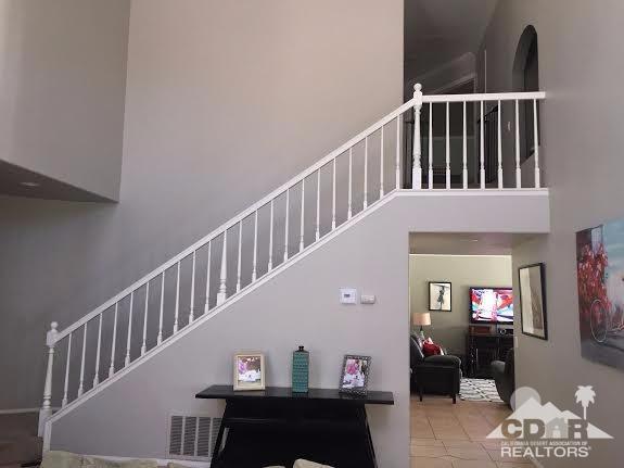 41310 Carlotta Drive Palm Desert, CA 92211 - Photo 11 of 32 a view of entryway and hall with wooden floor