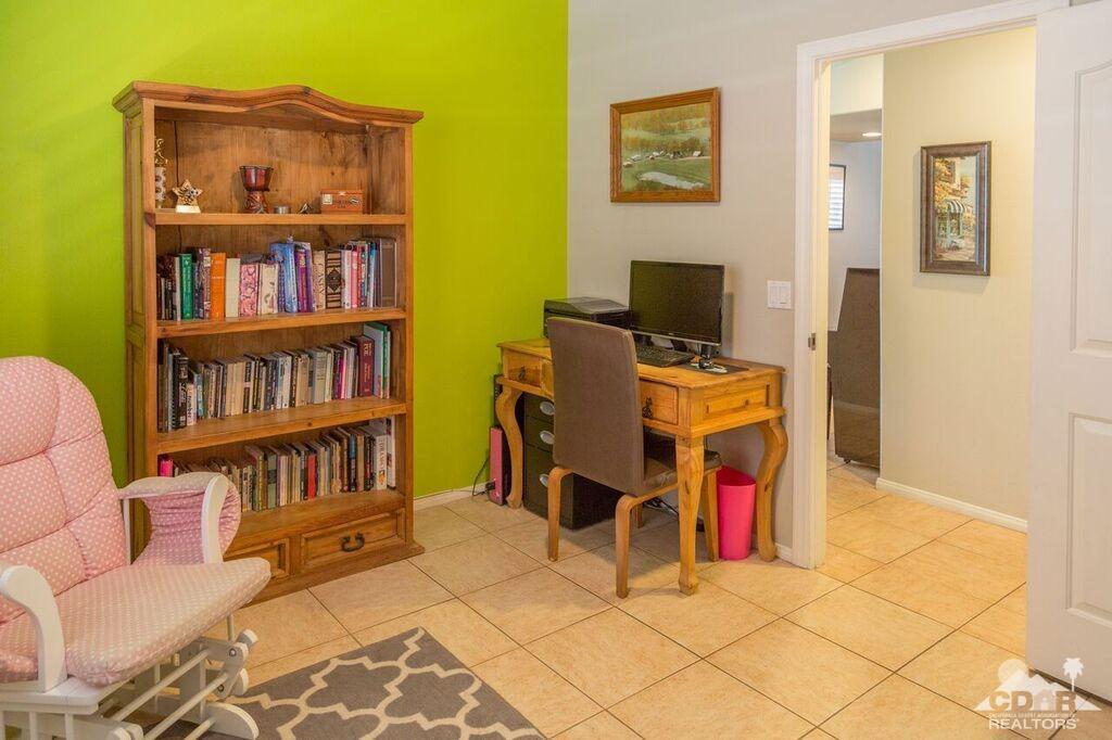 41310 Carlotta Drive Palm Desert, CA 92211 - Photo 21 of 32 a view of living room with furniture and cabinets