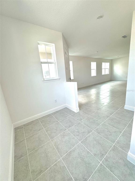 4826 Prairie Preserve Run St. Cloud, FL 34772 - Photo 12 of 44 a view of a livingroom with a window