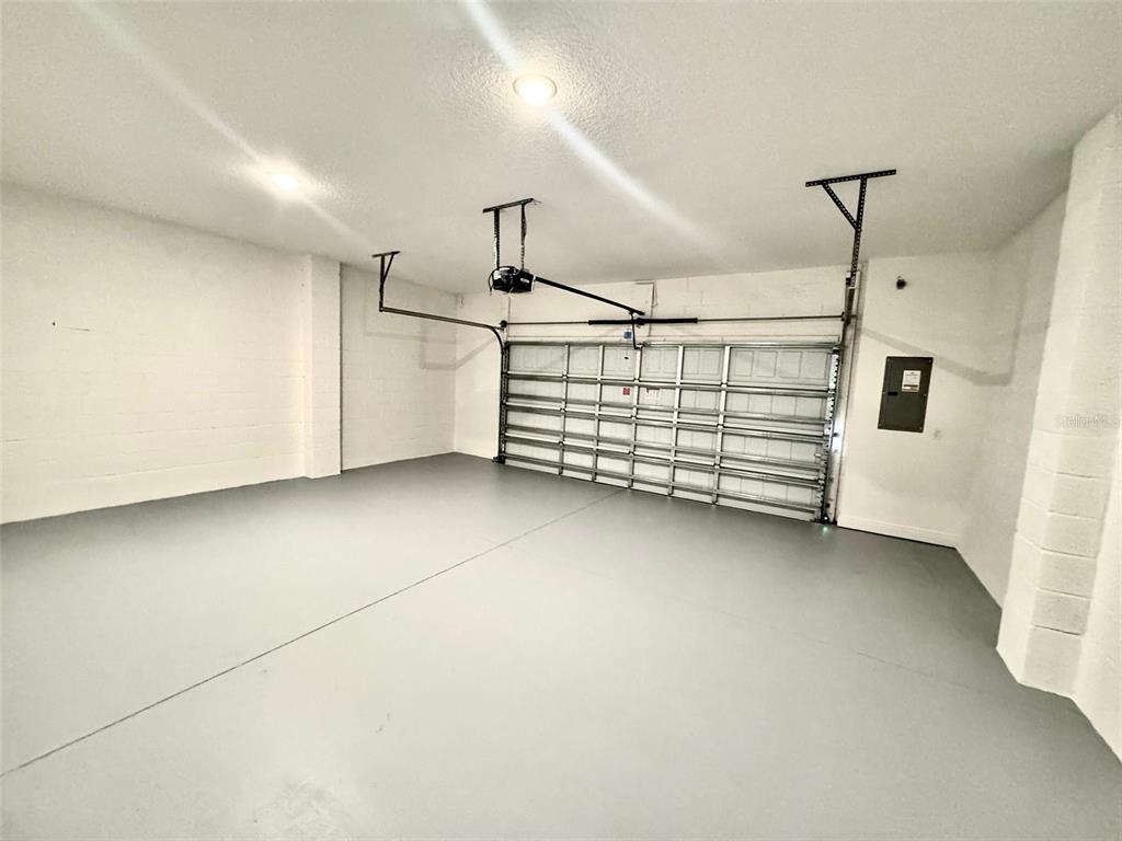 4826 Prairie Preserve Run St. Cloud, FL 34772 - Photo 33 of 44 a view of a garage