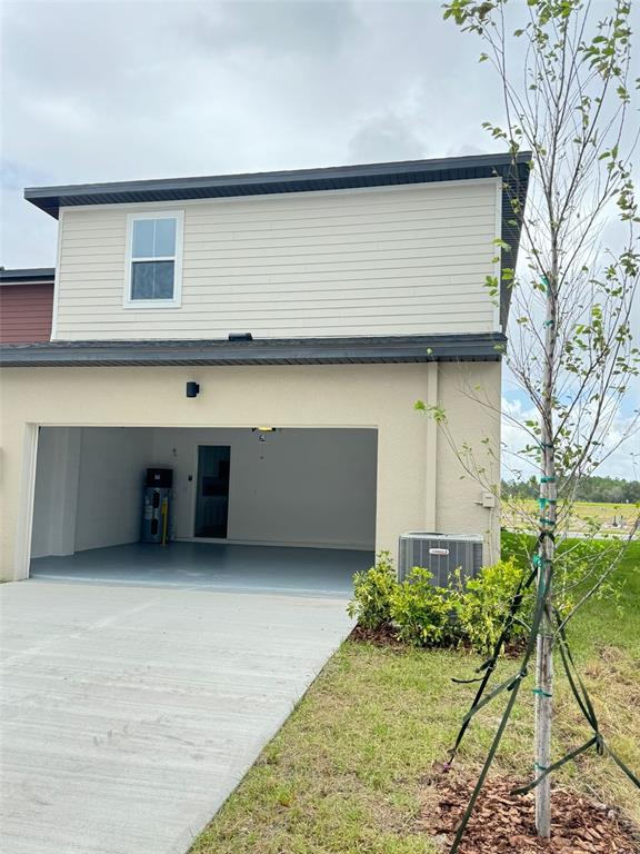 4826 Prairie Preserve Run St. Cloud, FL 34772 - Photo 35 of 44 a house view with a backyard space