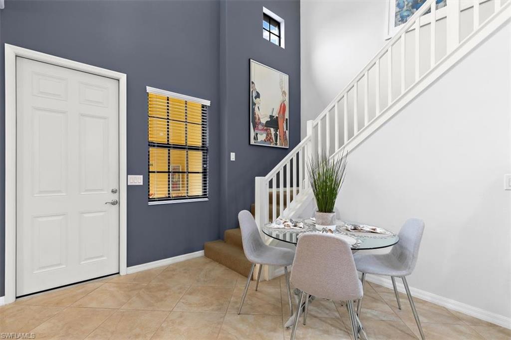8985 Cambria Circle, Unit 211 Naples, FL 34113 - Photo 2 of 41 a view of a livingroom with furniture