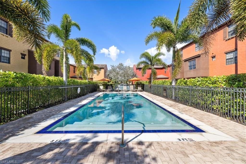 8985 Cambria Circle, Unit 211 Naples, FL 34113 - Photo 26 of 41 a view of swimming pool with a patio