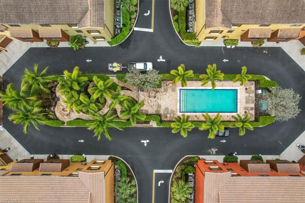 8985 Cambria Circle, Unit 211 Naples, FL 34113 - Photo 27 of 41 an aerial view of a house